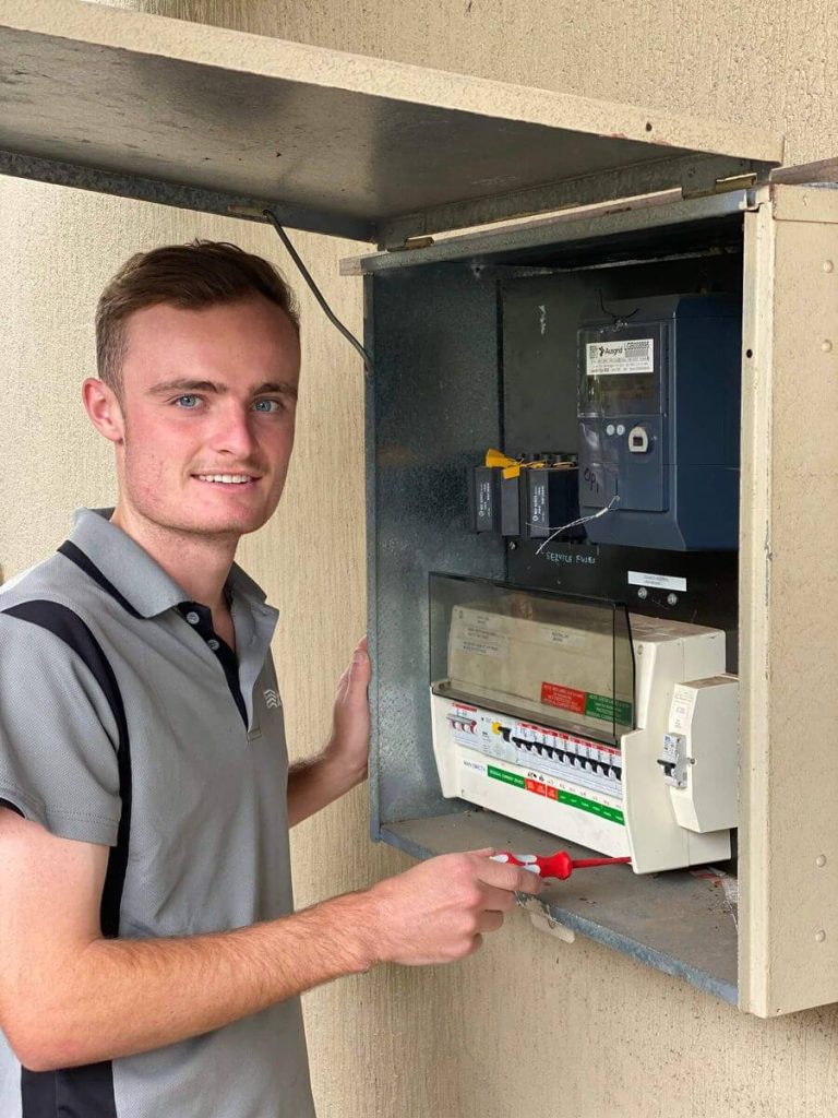 Employee working at Electrical Switchboard