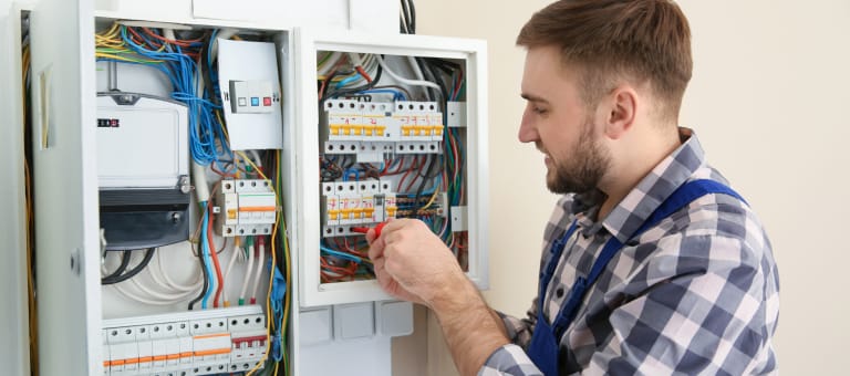 Electrician working on Main switchboard